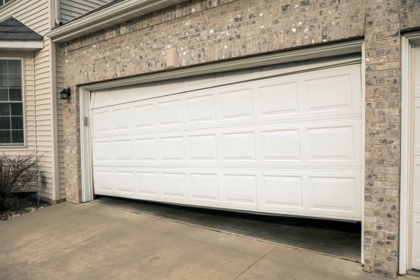 A Garage door is broken and not functional.